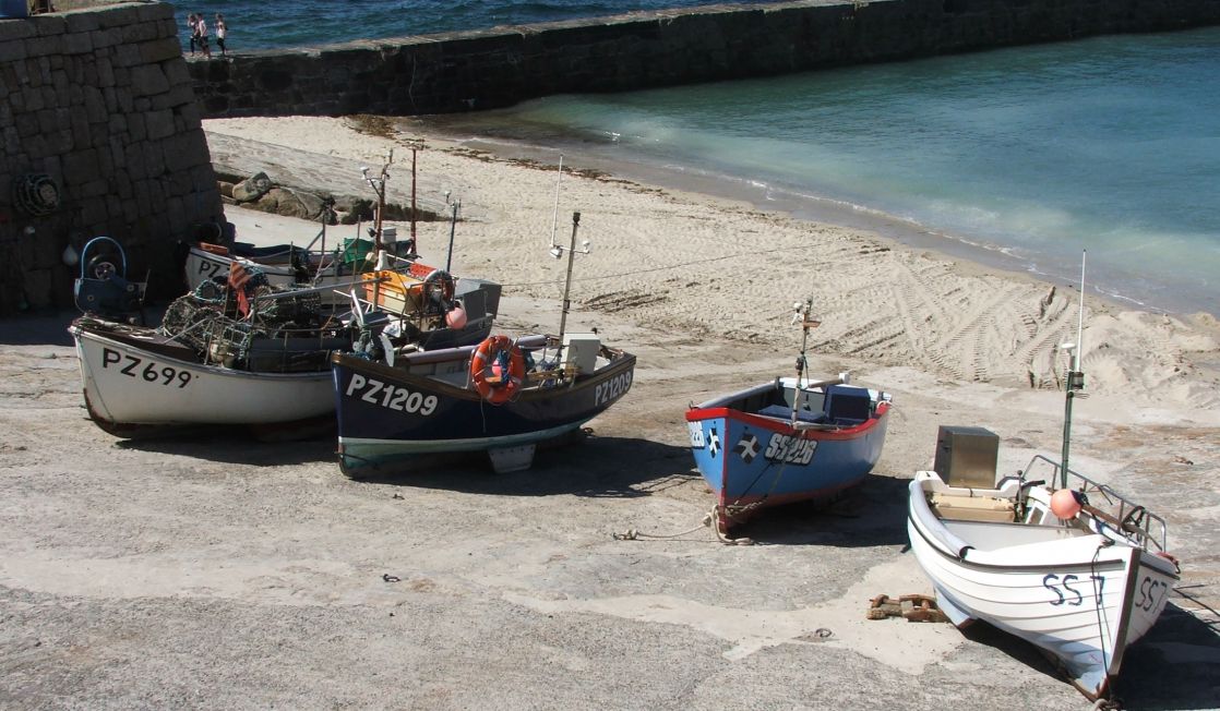 Sennen Cove harbour with boats