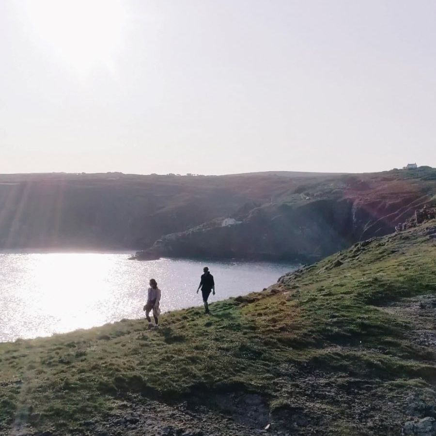 two walkers on the coast path